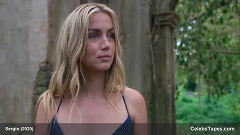 Ana de Armas bares her breasts and enjoys a steamy lovemaking session