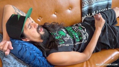 Bearded stoner Maxx Stoner delivers a massive cumshot from the couch